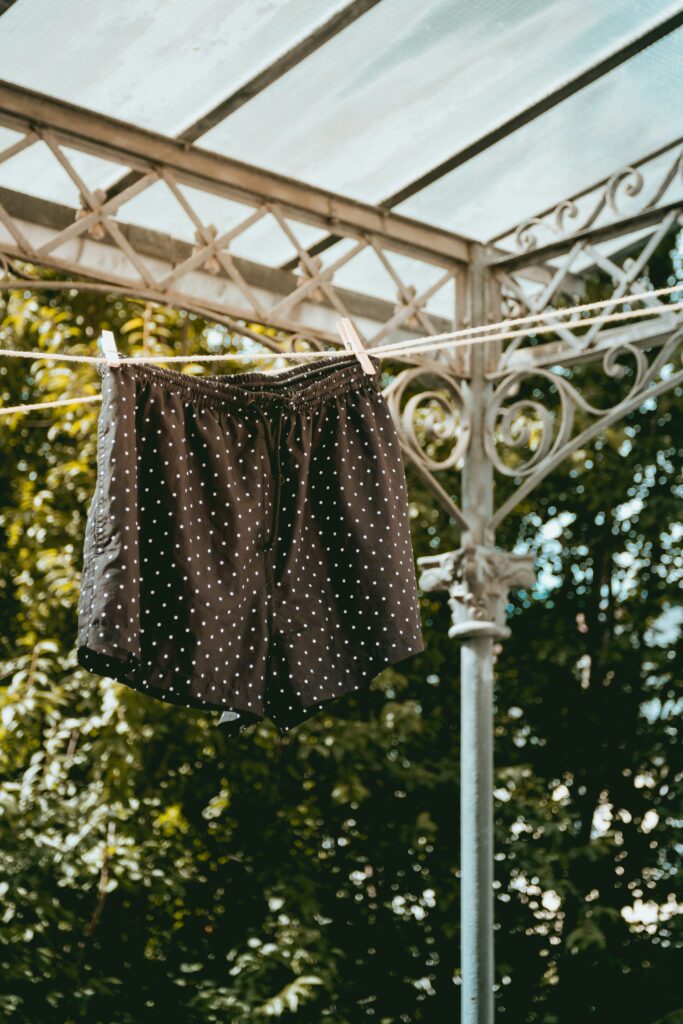 Shorts hanging on a clothes line.